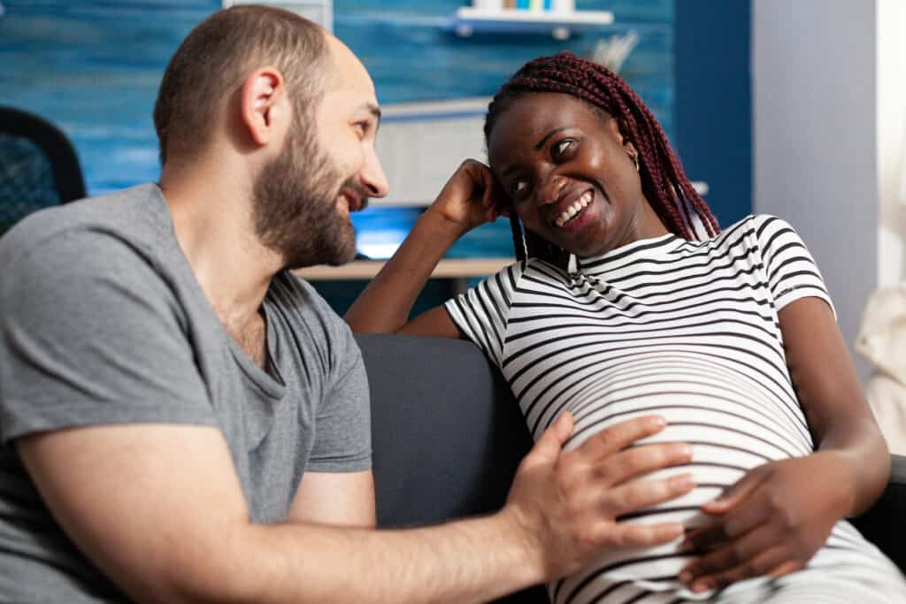 domestic partnership pregnant multiethnic couple